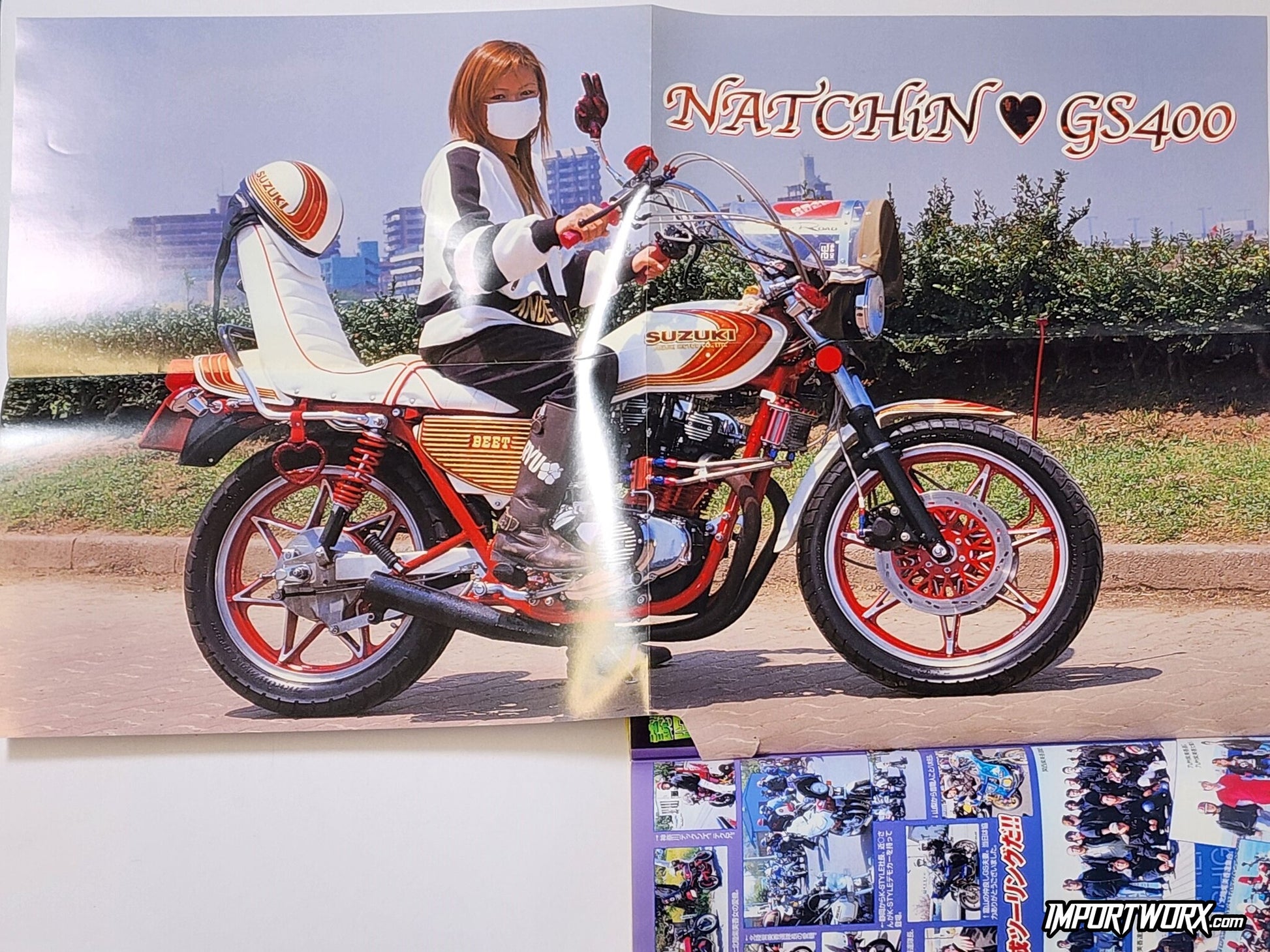 Champ Road October 2007 issue poster-style fold-out of Moriko riding a Suzuki GS400 motorcycle.