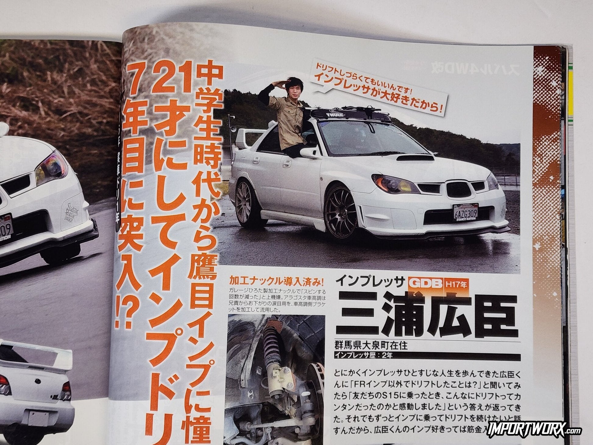 White Subaru Impreza WRX GDB showcased in drift trim.