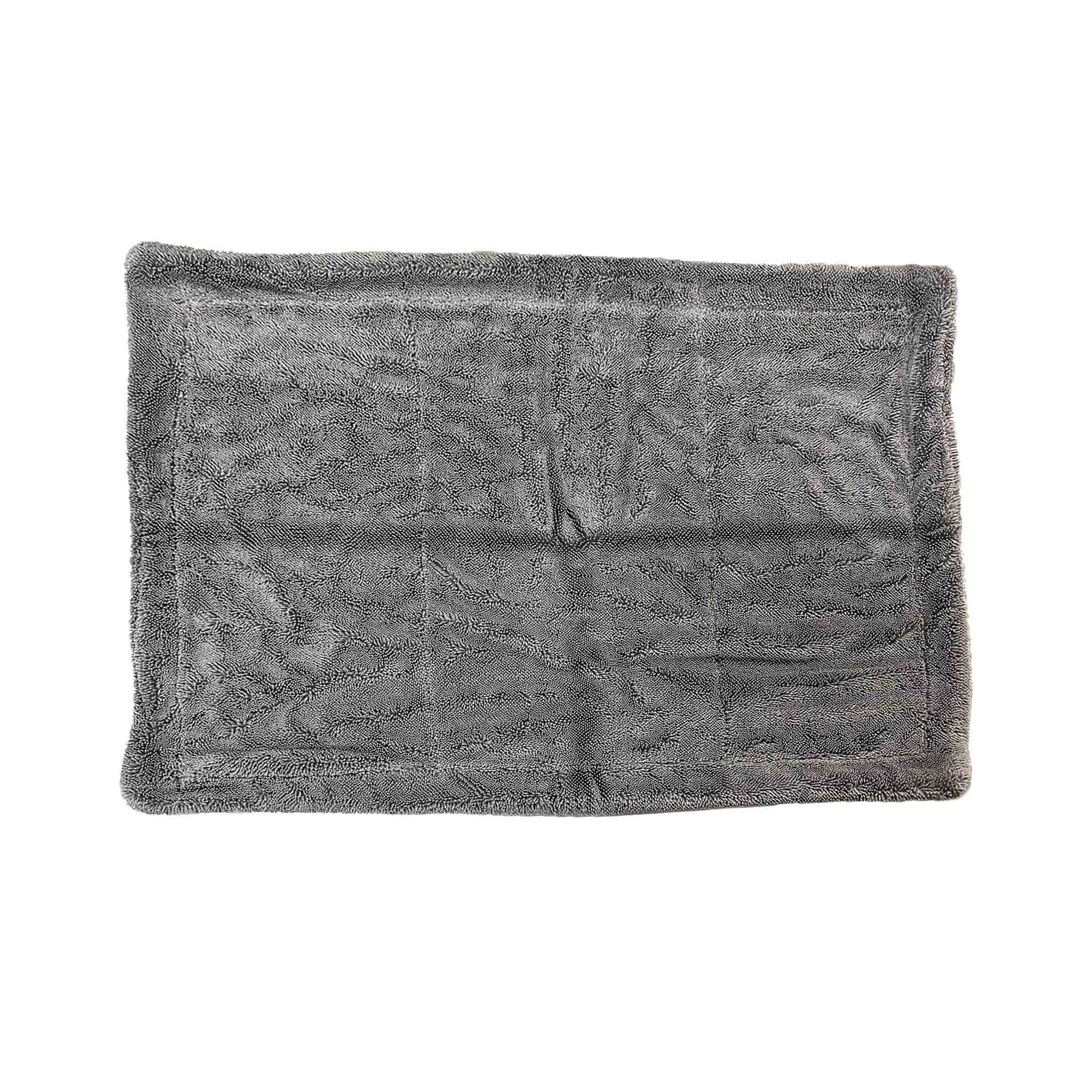 A dark gray textured microfiber towel with a stitched border, laid flat on a white background.